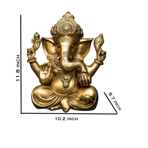 Close-up of brass Ganesha blessing statue showing facial expression and fine detailing.