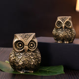 Brass owl pair