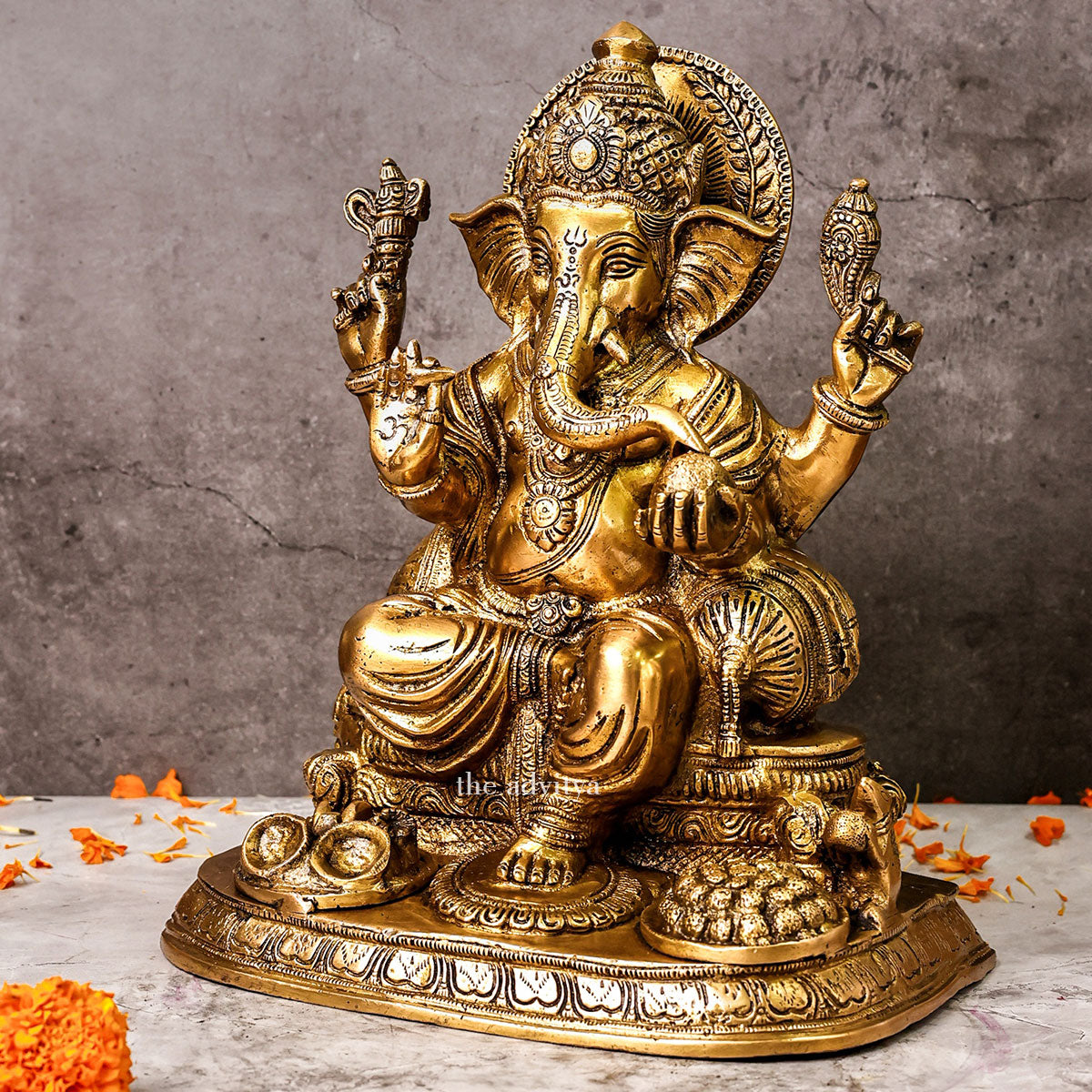 Vinayaka, Vinayak, Vigneshwara, Vighneshvara,Vighnaharta,Vakratunda, Ganesha sitting on base,