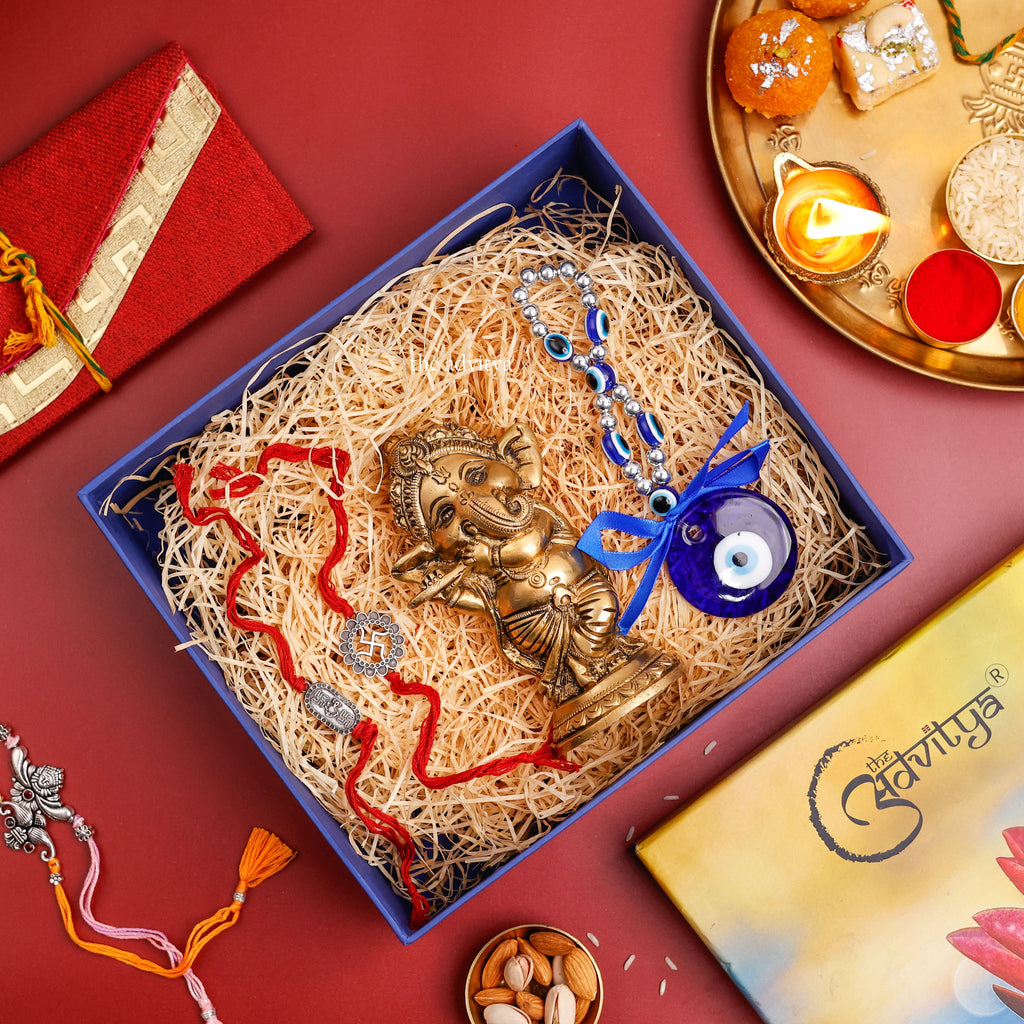 rakhi gifting,rakhi hamper,rakhi special colection,2 Rakhis with Ganesha and Evil eye wall hanging