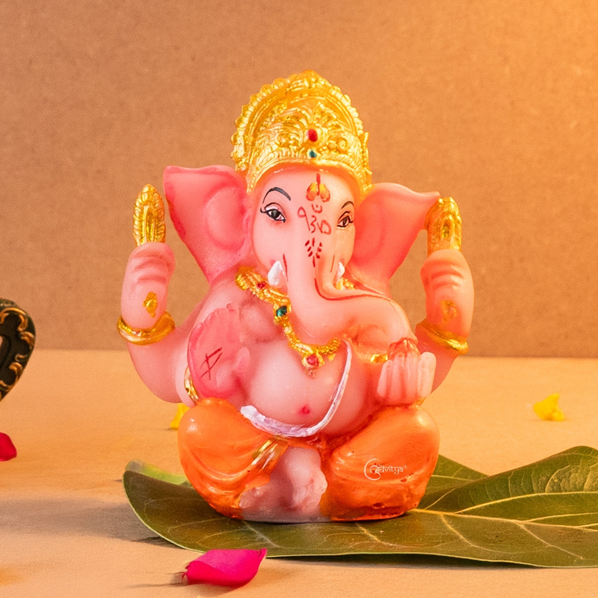 Ganesha Idol in Orange Resin
