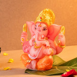 Ganesha Idol in Orange Resin
