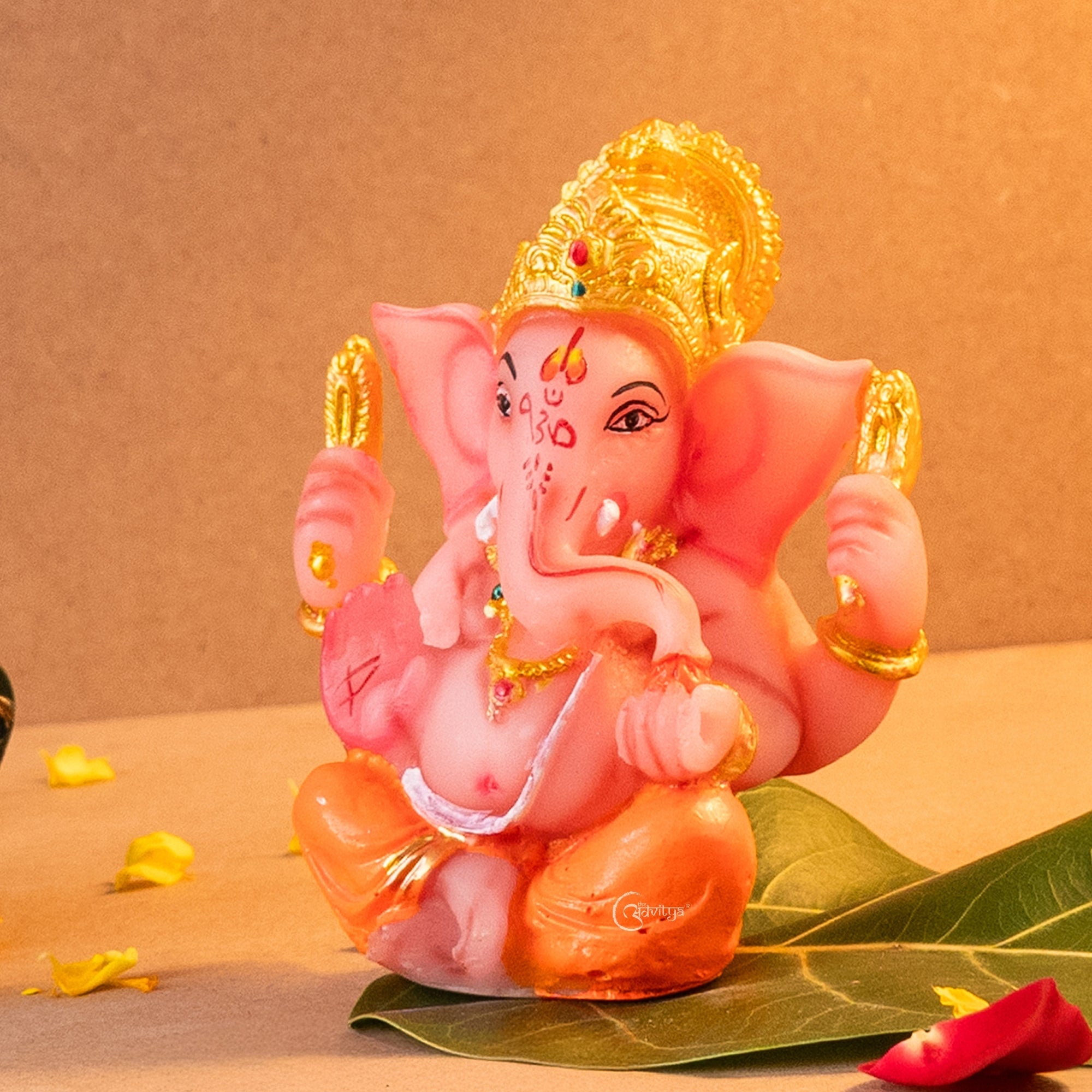 Ganesha Idol in Orange Resin
