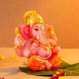 Ganesha Idol in Orange Resin