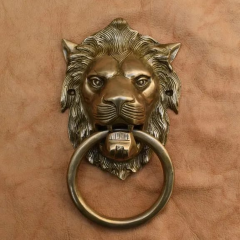 Brass lion door knocker