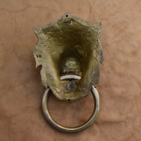 Brass lion door knocker