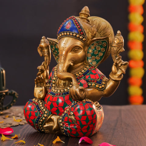 Side view of 8 inch Ganesha statue showing colorful stonework design