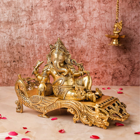 Vinayak,Vigneshwara,Vakratunda,Ganapati,Gajanand,Ganesha ,Ganesha resting on peacock couch