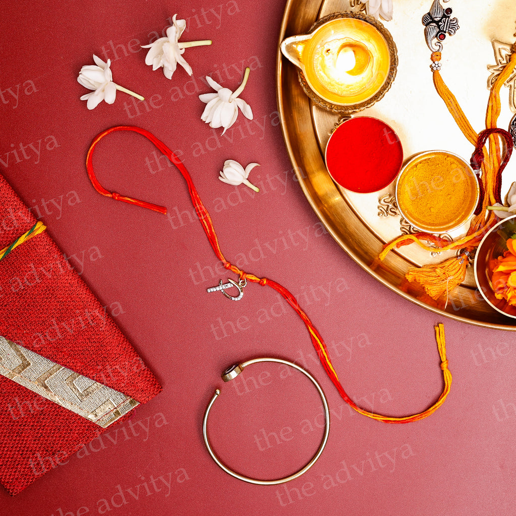 Rakhi ,Handmade rakhi, Rakhi Special Collection ,Rakhi Gifting, Alphabet P Rakhi Designs in AD Pendant with Golden Evil Eye Bracelet for Bhabhi