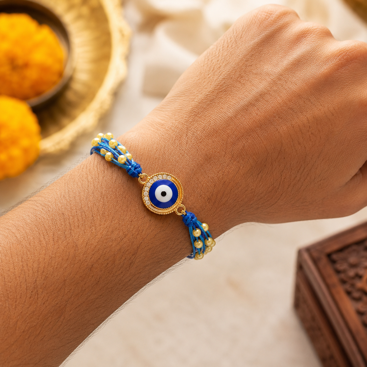 Blue Evil Eye Crystal Pearl Rakhi for Raksha Bandhan with Roli Chawal