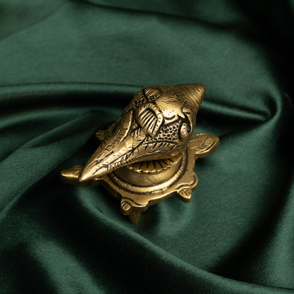 Brass Shankha On Tortoise Stand with Ganesha Detailing