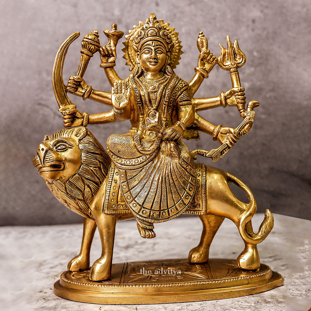 Durga murti with eight hands sitting on the lion.