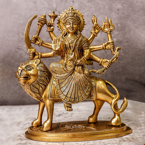 Durga murti with eight hands sitting on the lion.
