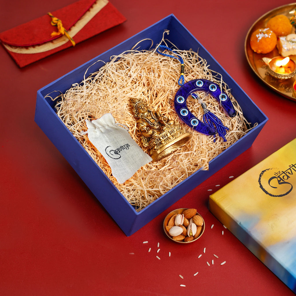 Diwali Hamper with Brass Kuber Statue, Assorted Evil Eye Wall Hanging, and Almonds (75 to 100g)