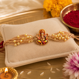Handcrafted Divine Ganesha Pearl Rakhi for Raksha Bandhan with Roli Chawal