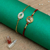 Peacock Feather Rakhi For Bhaiya Bhabhi  (Roli + Chawal)