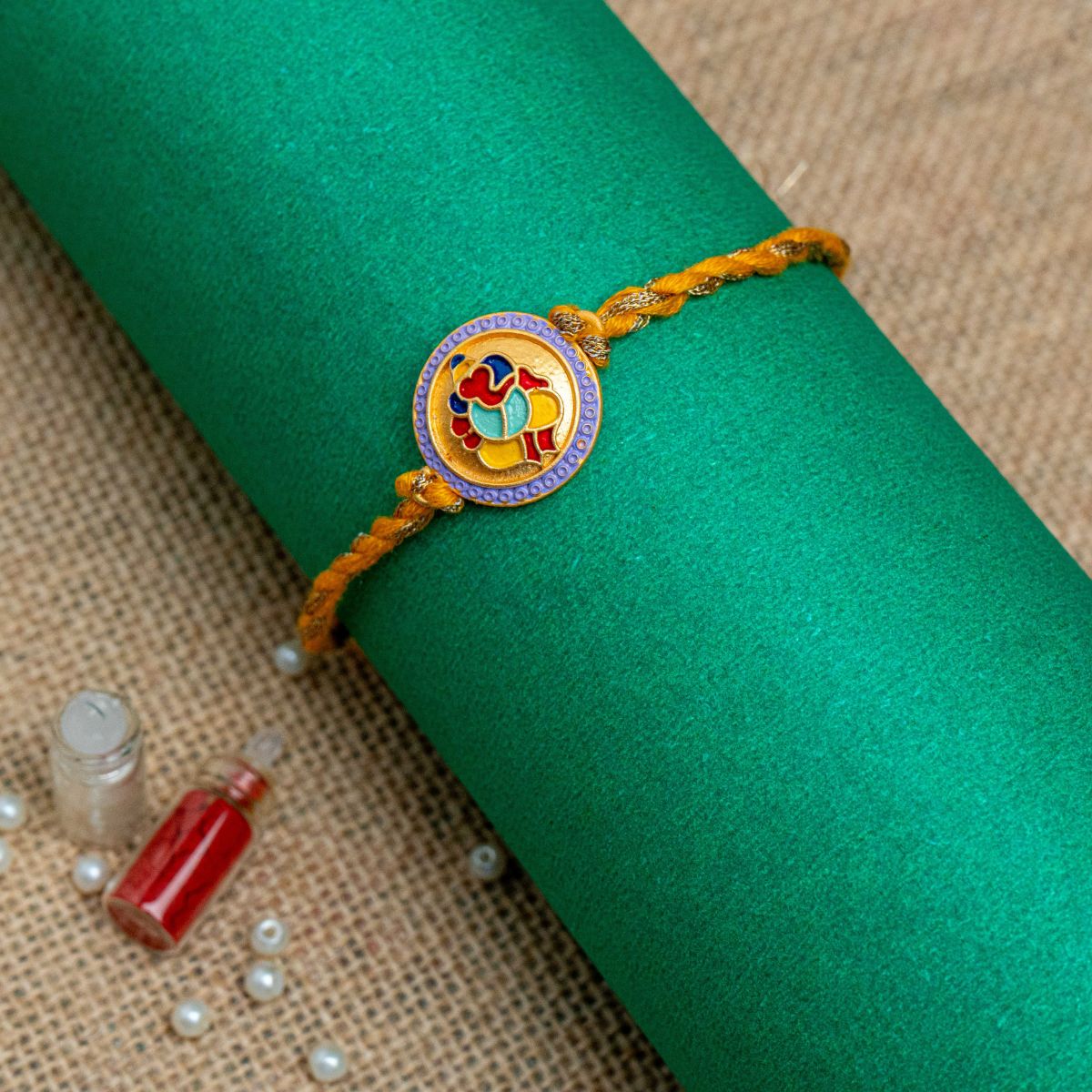 Ganesha Thread Rakhi for Brother With Roli Chawal (Yellow)