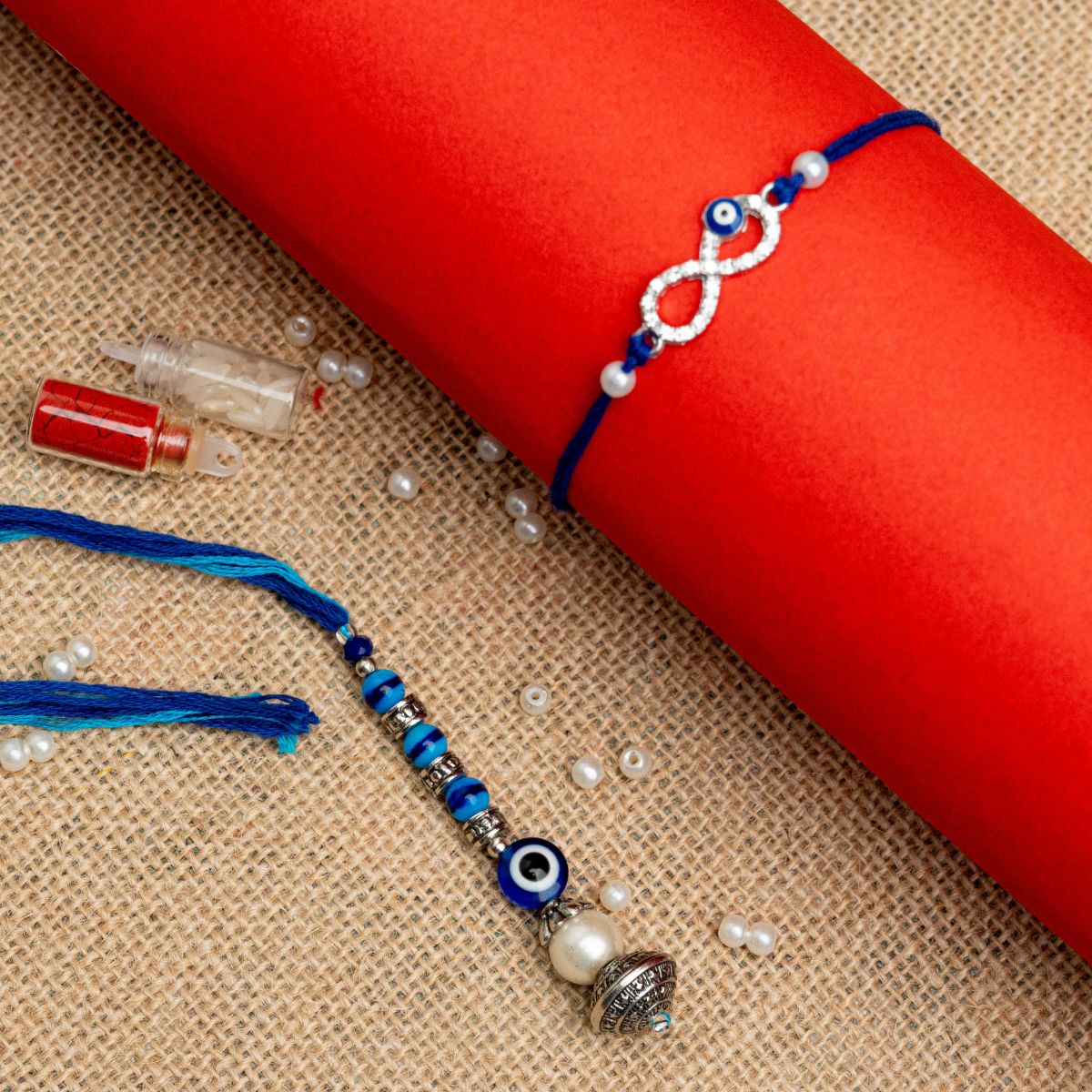 Evil Eye Infinity Rakhi with Evil Eye Lumba Combo for Bhaiya Bhabhi  (Roli + Chawal)