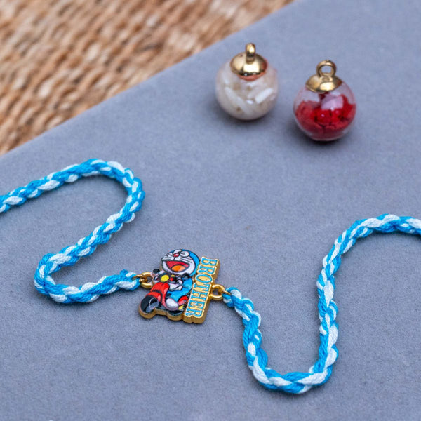 Kids Doraemon Thread Rakhi of Silicon With Roli Chawal
