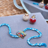 Kids Doraemon Thread Rakhi of Silicon with Roli Chawal