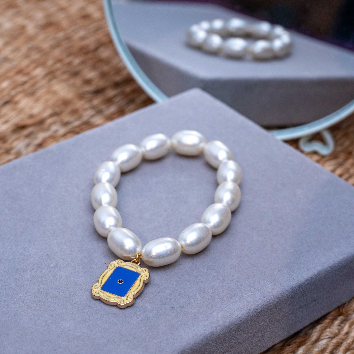 Friends TV Show Charm in Pearl Bracelet Rakhi for Sister  with Roli Chawal