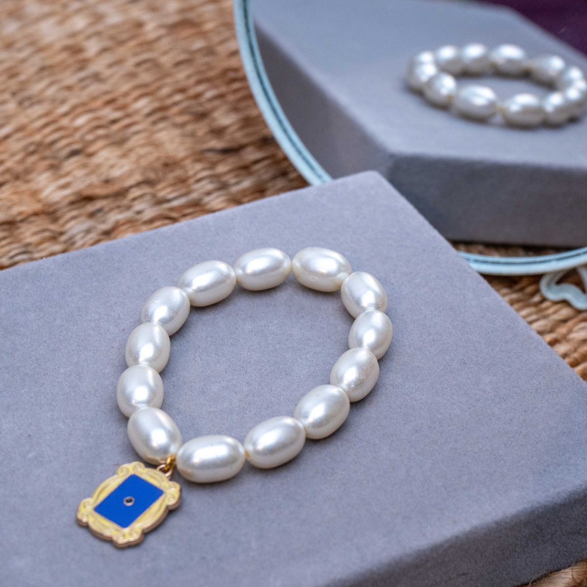 Friends TV Show Charm in Pearl Bracelet Rakhi for Sister  with Roli Chawal