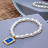 Friends TV Show Charm in Pearl Bracelet Rakhi for Sister  with Roli Chawal