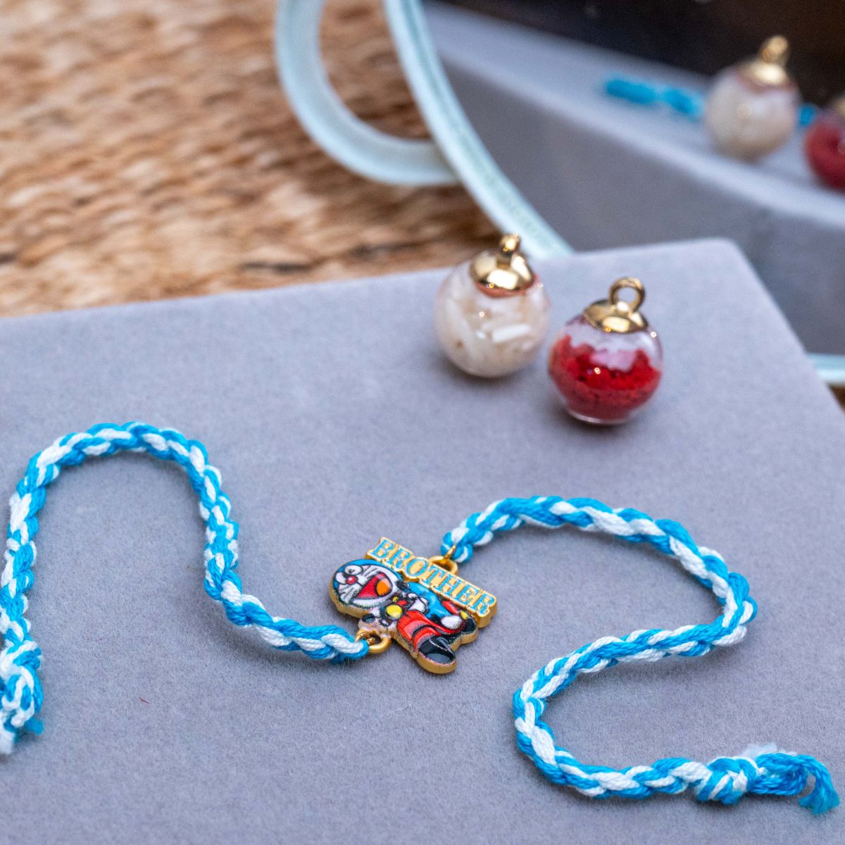 Kids Doraemon Thread Rakhi of Silicon with Roli Chawal