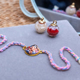 Kids Bal Ganesha Rakhi in Coral & Thread With Roli Chawal
