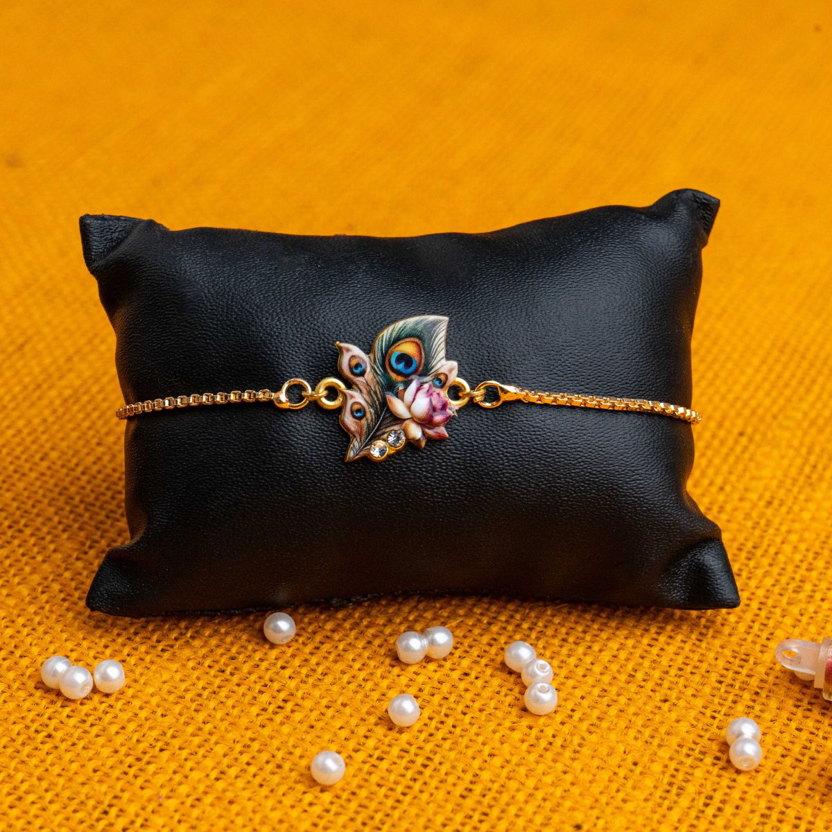 Peacock Feather with Lotus Bracelet Rakhi Set for Sister & Bhabhi with Roli Chawal