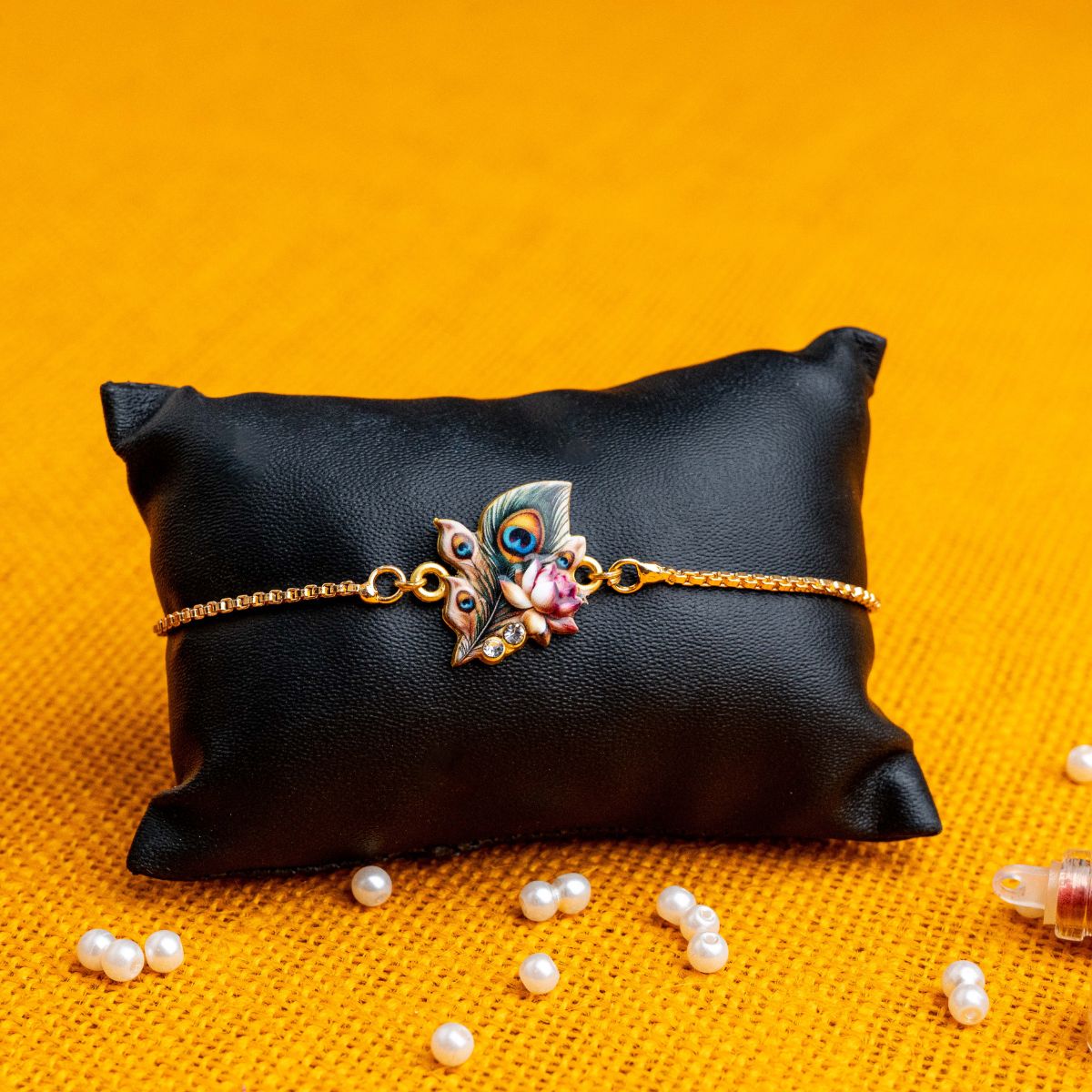Peacock Feather with Lotus Bracelet Rakhi Set for Sister & Bhabhi with Roli Chawal