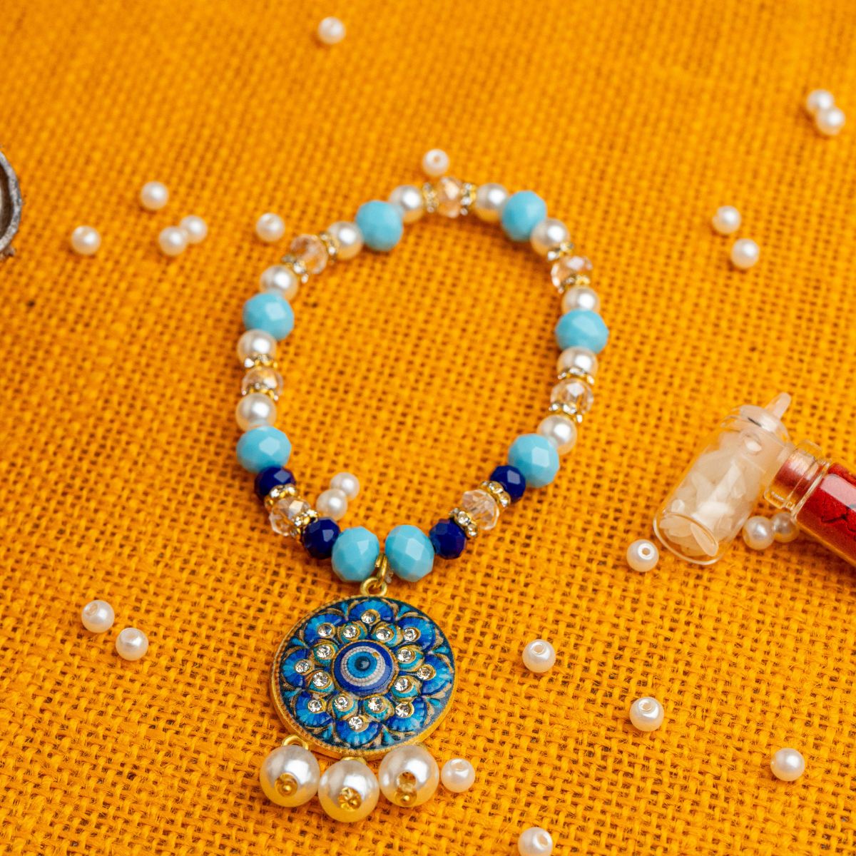 Evil Eye Mandala Bracelet Lumba Rakhi for Bhabhi With Pearl & Crystal( Roli +Chawal)