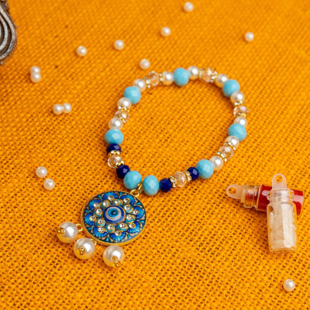 Evil Eye Mandala Bracelet Lumba Rakhi for Bhabhi With Pearl & Crystal( Roli +Chawal)