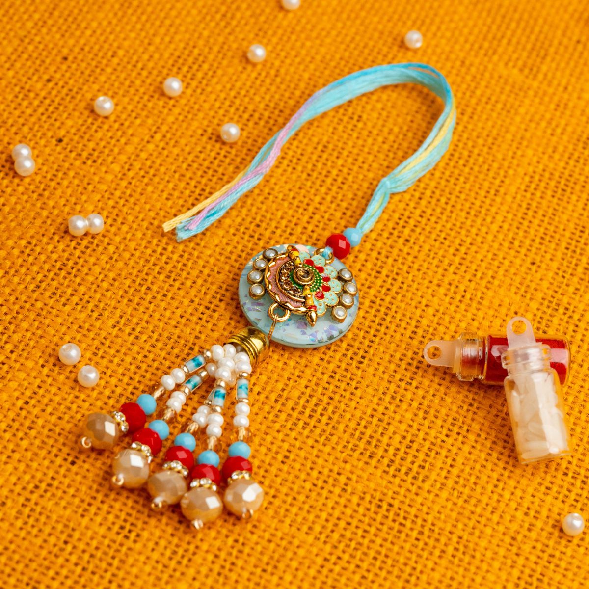 Blue Kundan Flute Lumba Rakhi for Bhabhi With Roli Chawal