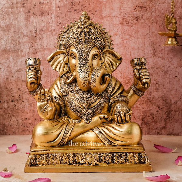 Brass Lord ganesha sitting on Chowki