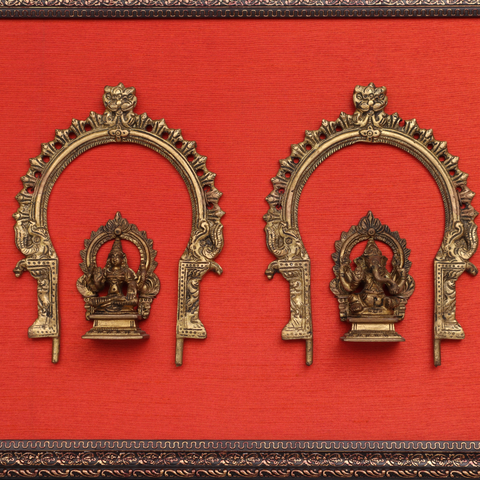 Brass Ganesh & Laxmi on Fabric Wooden Frame