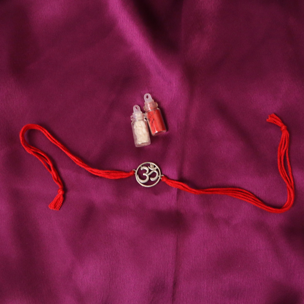 Sacred OM Silver Charm Thread Rakhi (Roli+Chawal)