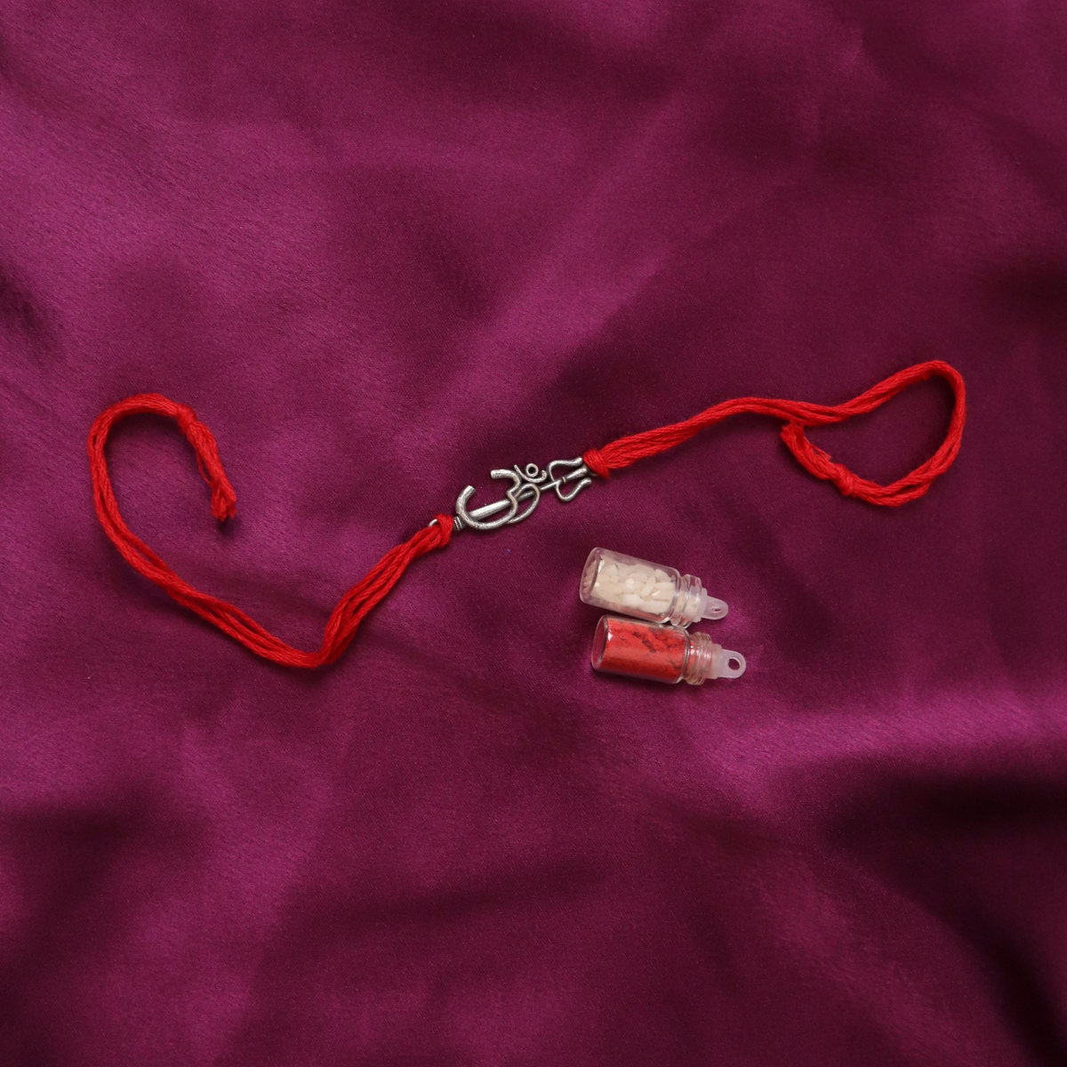 OM & Trishul Thread Rakhi (Roli+Chawal)