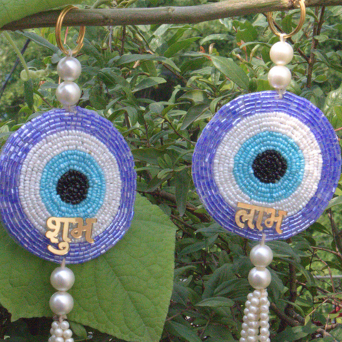 Crystal Studded Evil Eye Shubh-Labh Pair with Seashells Hanging With Tlight Candle Holder