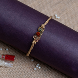 Rudraksha Shri Krishna Rakhi for Brother  (Roli + Chawal)
