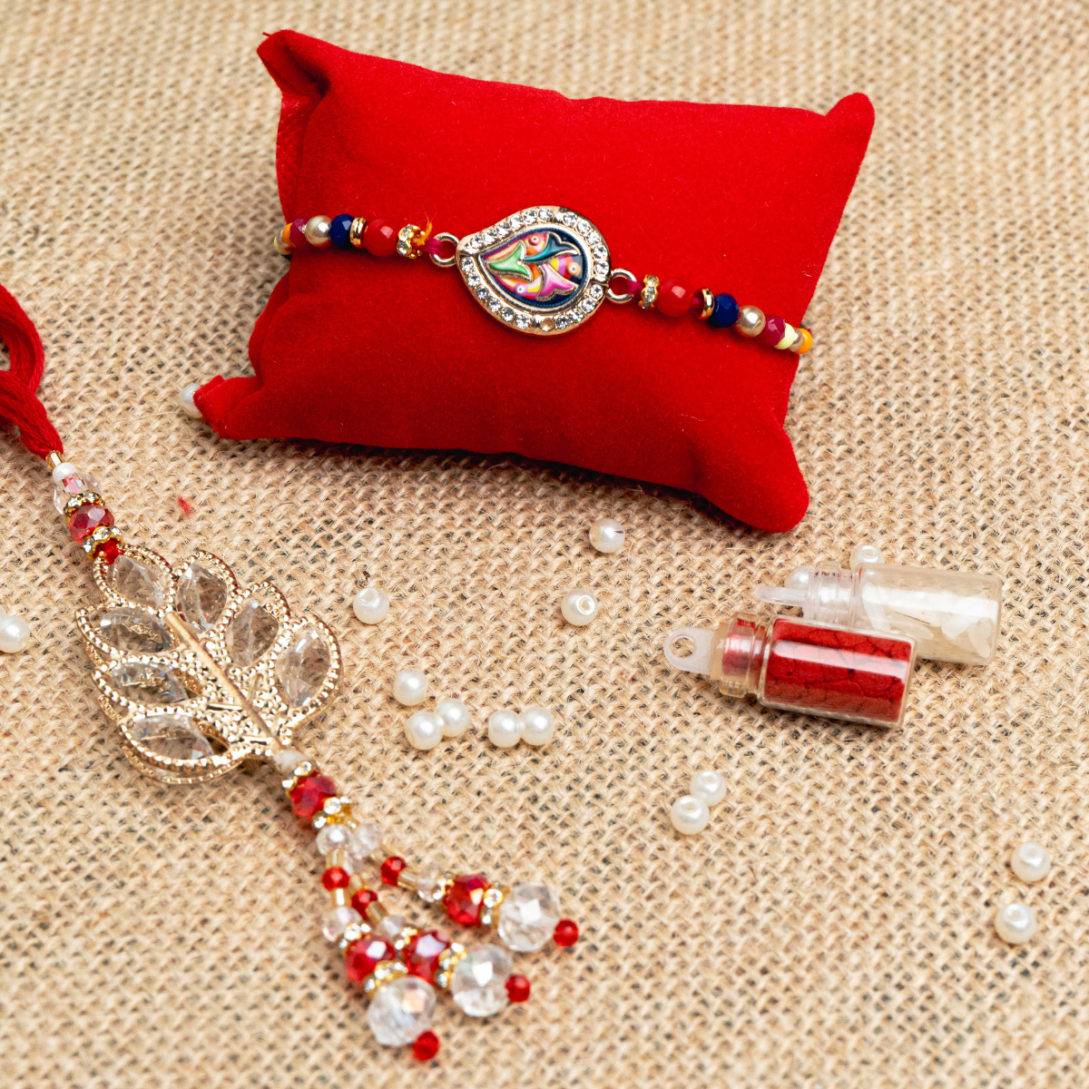 Swarovski Leaf Rakhi & Lumba Set for Bhaiya Bhabhi  (Roli + Chawal)
