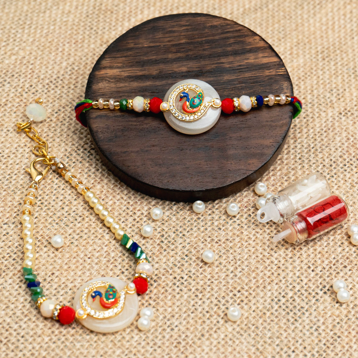 Peacock on Oval White Base Rakhi & Bracelet Lumba Set for Bhaiya Bhabhi  (Roli + Chawal)