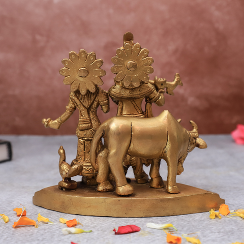 Back view of Radha Krishna statue with cow showing fine craftsmanship and design.