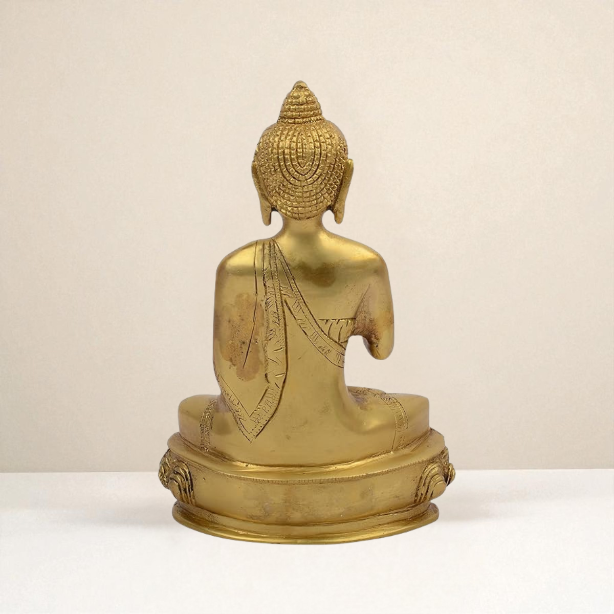 Back view of Amitabha Buddha brass statue showing smooth brass finish, detailed robe folds, and balanced seated posture.