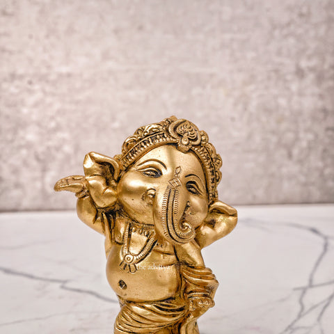 Baby Dancing Ganesha Idol in gold in dancing steps