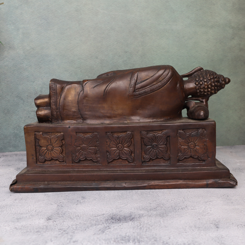 Back view brass antique sleeping Buddha statue ideal for home decor and meditation spaces.