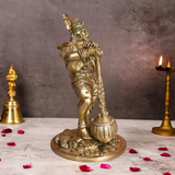 Right side angle of brass Bahubali Hanuman statue with raised arm and detailed craftsmanship