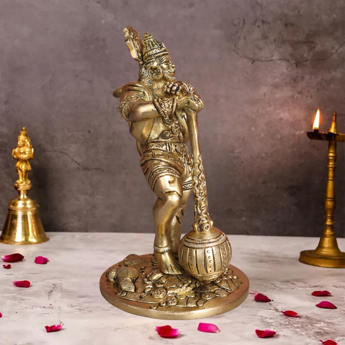 Right side angle of brass Bahubali Hanuman statue with raised arm and detailed craftsmanship