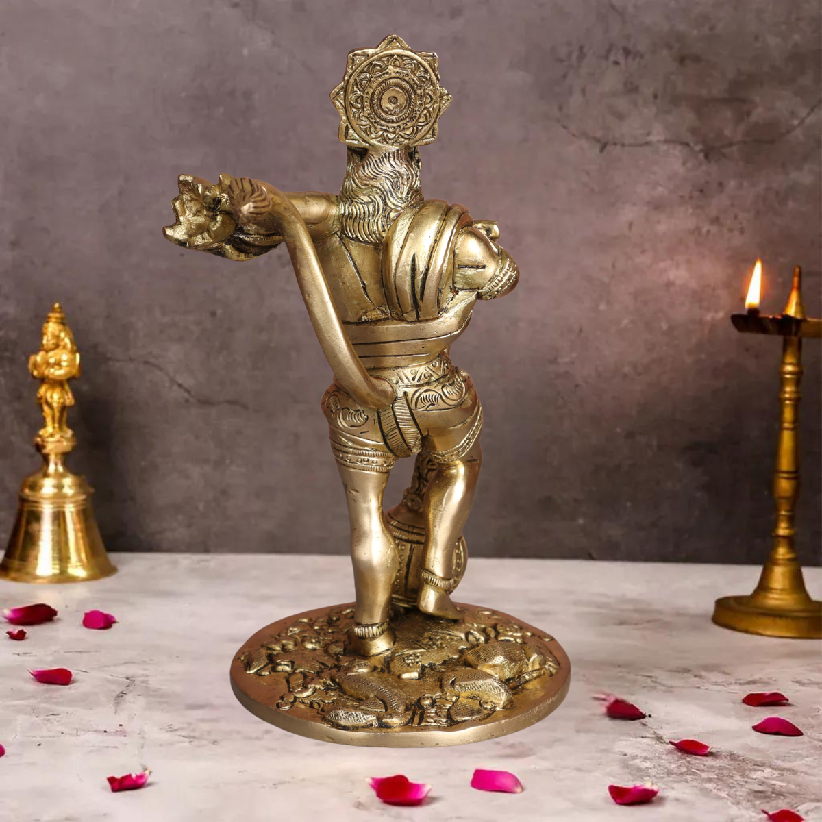 Back view of brass Bahubali Hanuman statue highlighting sculpted detailing and traditional finish.