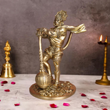Brass Bahubali Hanuman statue in powerful standing posture holding gada, front angle view.